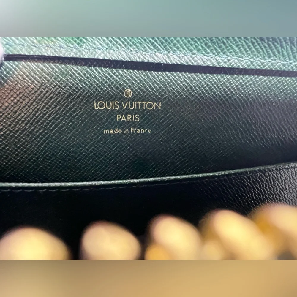 7006: Louis Vuitton Taiga Leather Wristlet & Checkbook Cover Set Green